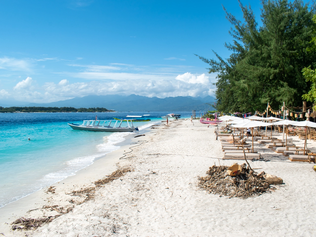 view of a white sand beach on east of gili trawangan
