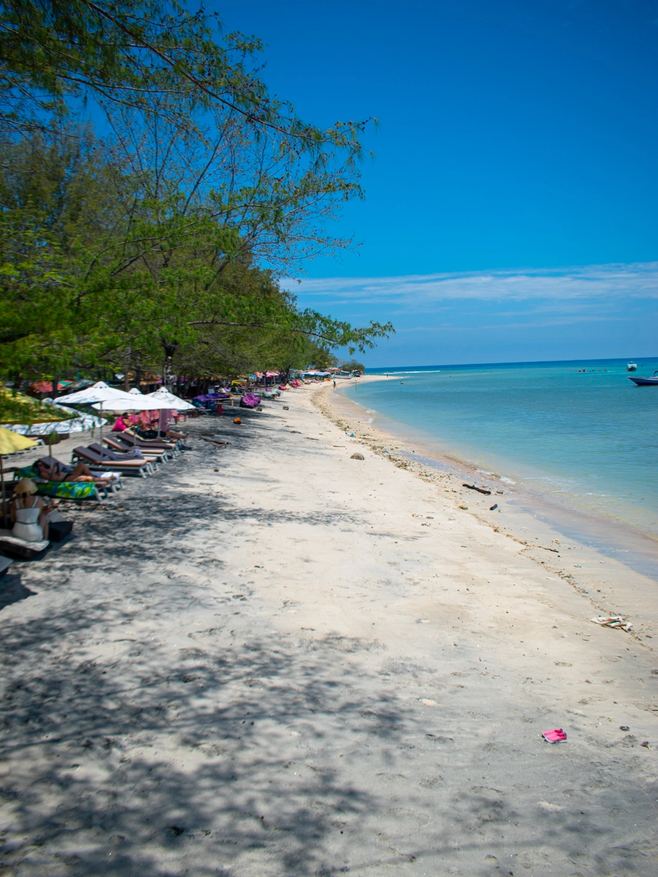 view of a white sand beach on the northeast side of gili trawangan